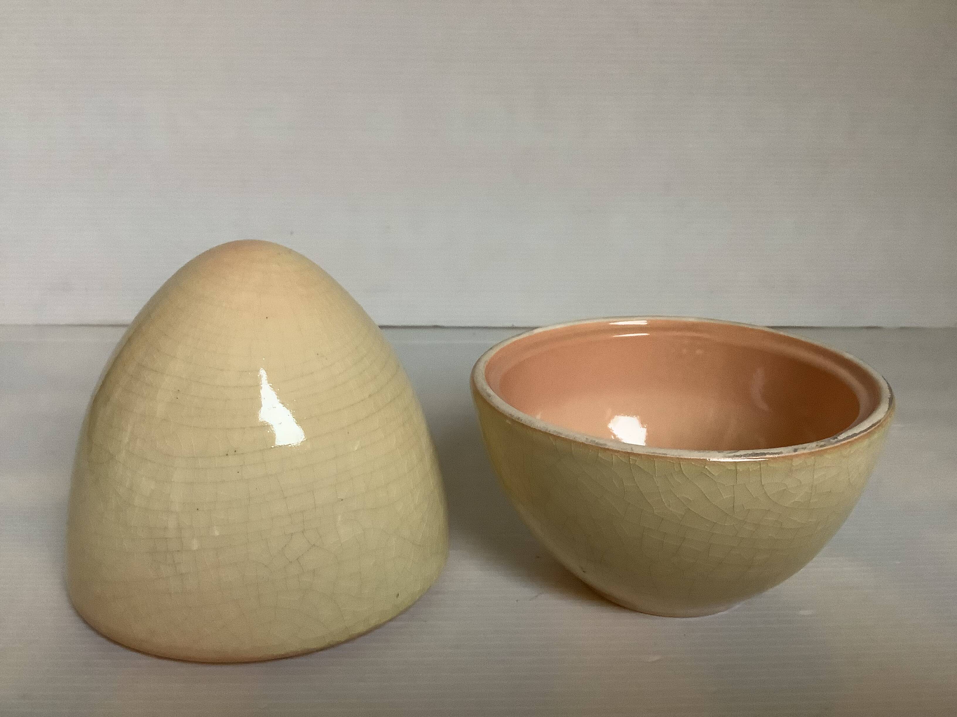 Candy box in the shape of an egg cracked ceramic