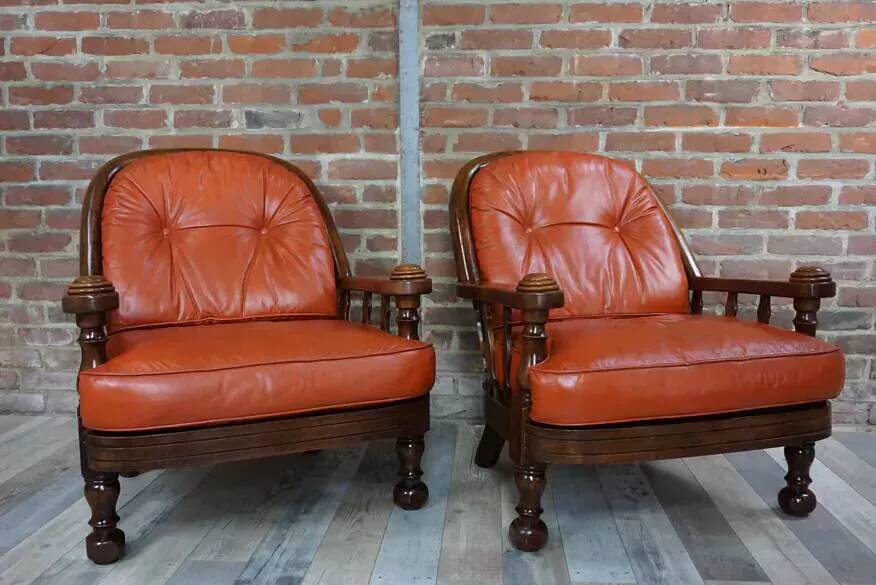 Pair of 60s armchairs in leather and wood