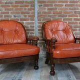 Pair of 60s armchairs in leather and wood