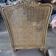 Four antique chairs in classic style with caning and upholstery.
