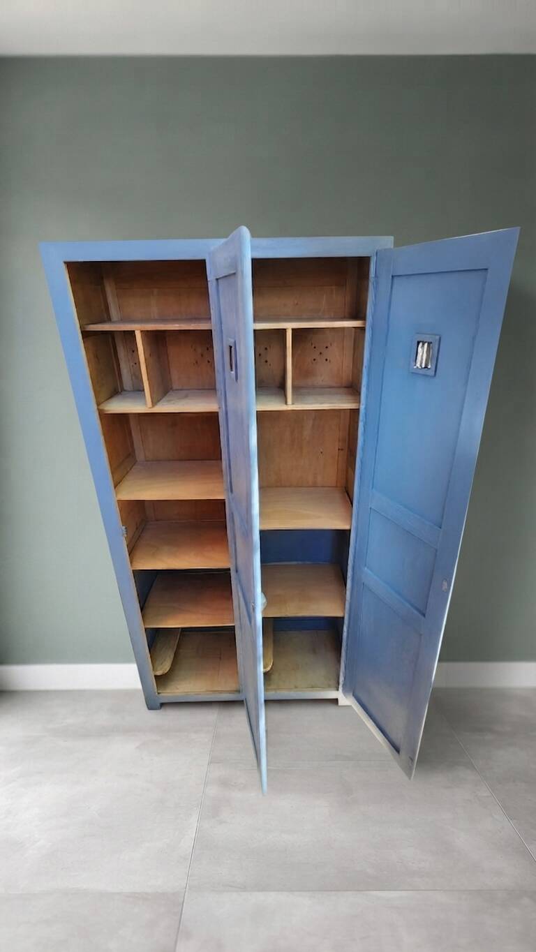 Vintage grey wooden wardrobe from 1914.