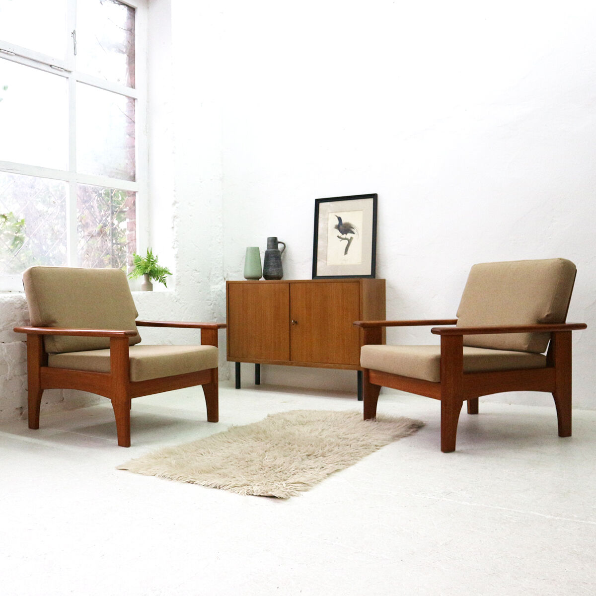 Mid-century scandinavian teak armchair with new covers
