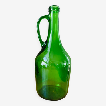 Vintage green glass bottle with handle