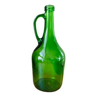 Vintage green glass bottle with handle