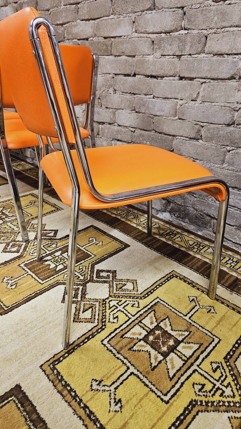 Set of 4 vintage chrome skai orange chairs 1970