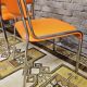 Set de 4 chaises chromées skaï orange 1970 vintage