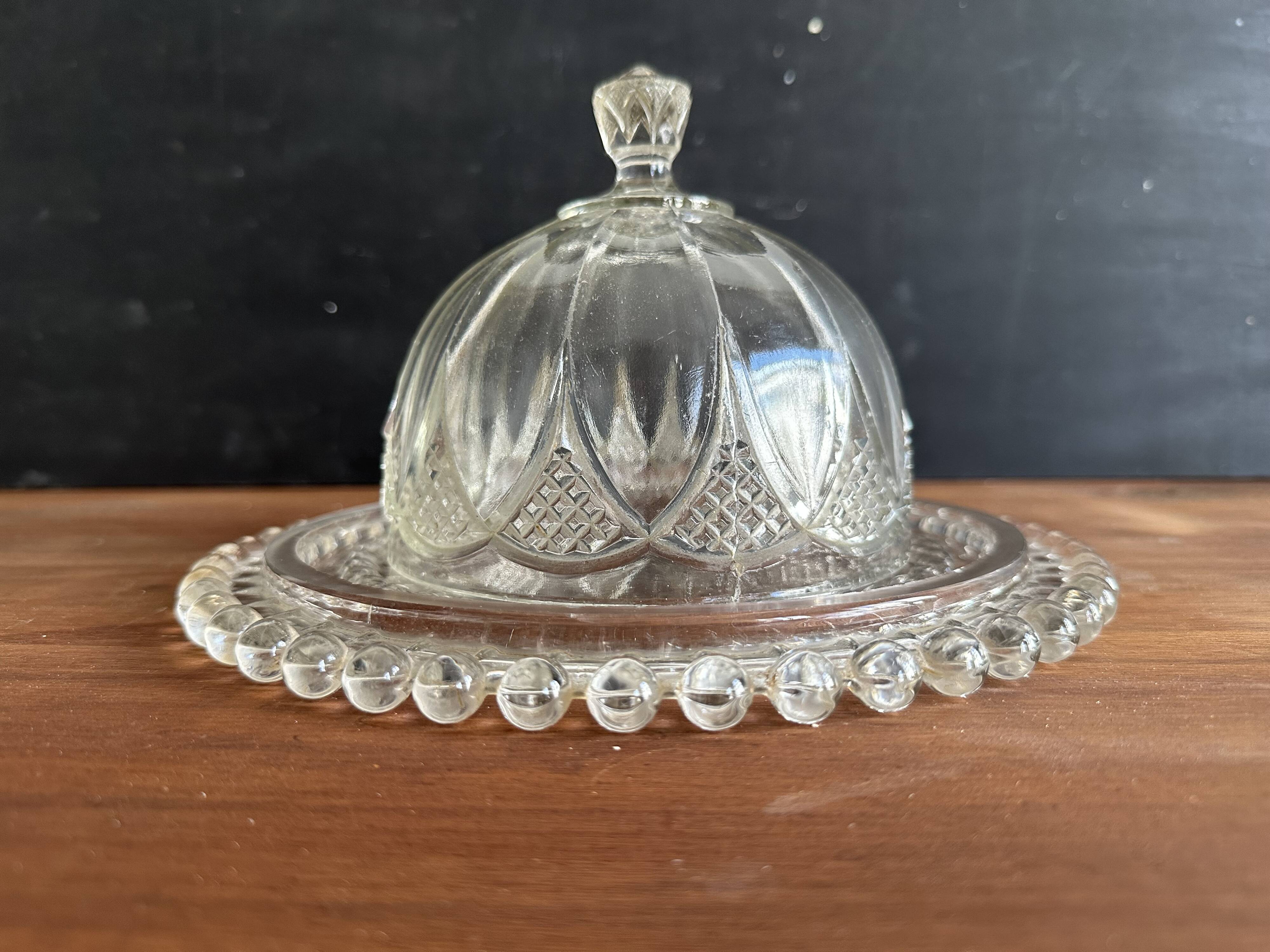 Vintage glass cheese dome with its plate, 1950s.