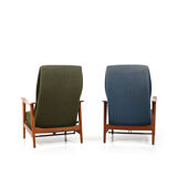 Pair of mid century Danish reclining lounge chairs in teak