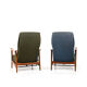 Pair of mid century Danish reclining lounge chairs in teak