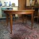Table ronde rallonge intégrée vintage