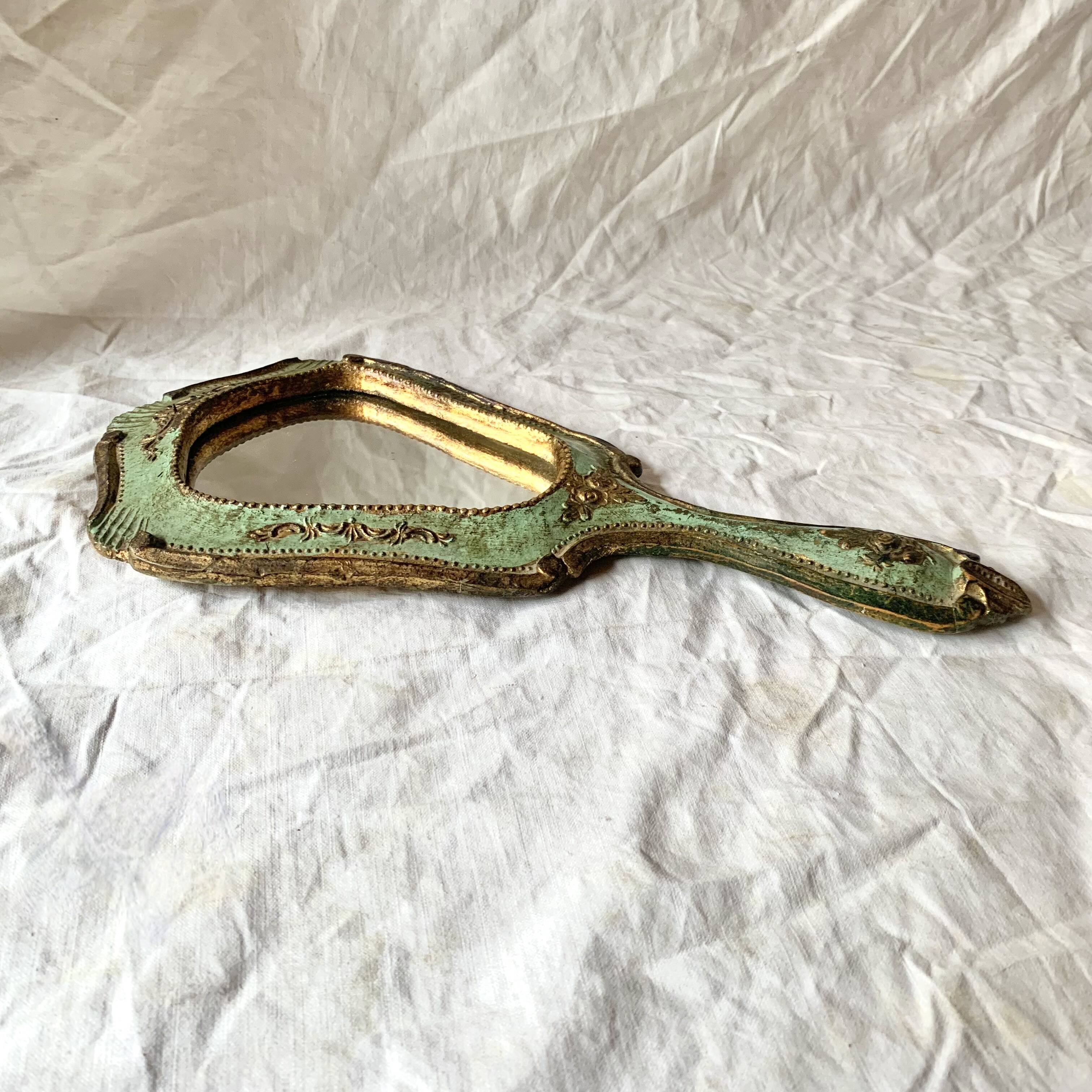 Old Florentine style carved wooden hand mirror