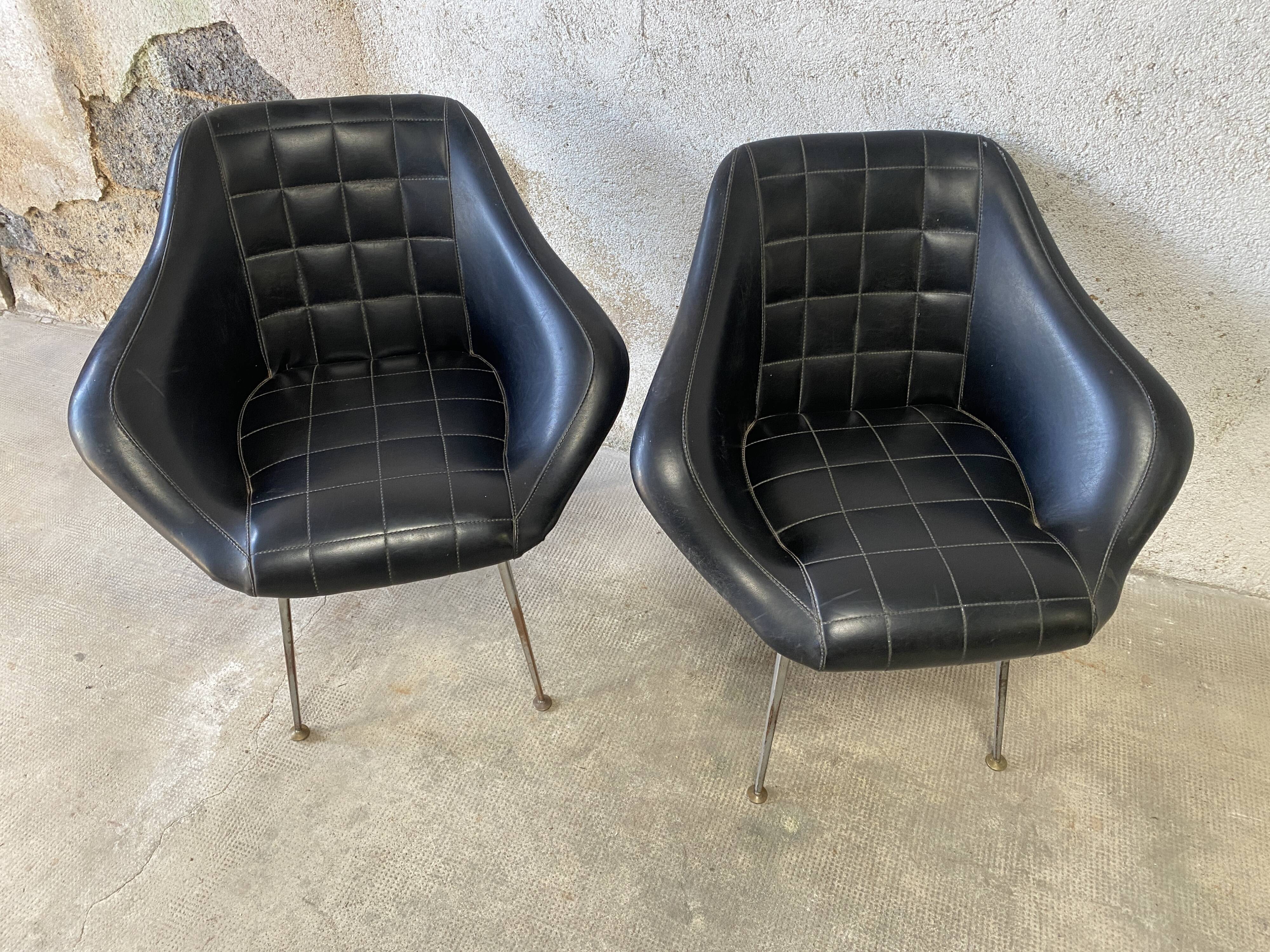 Pair of upholstered armchair year 60