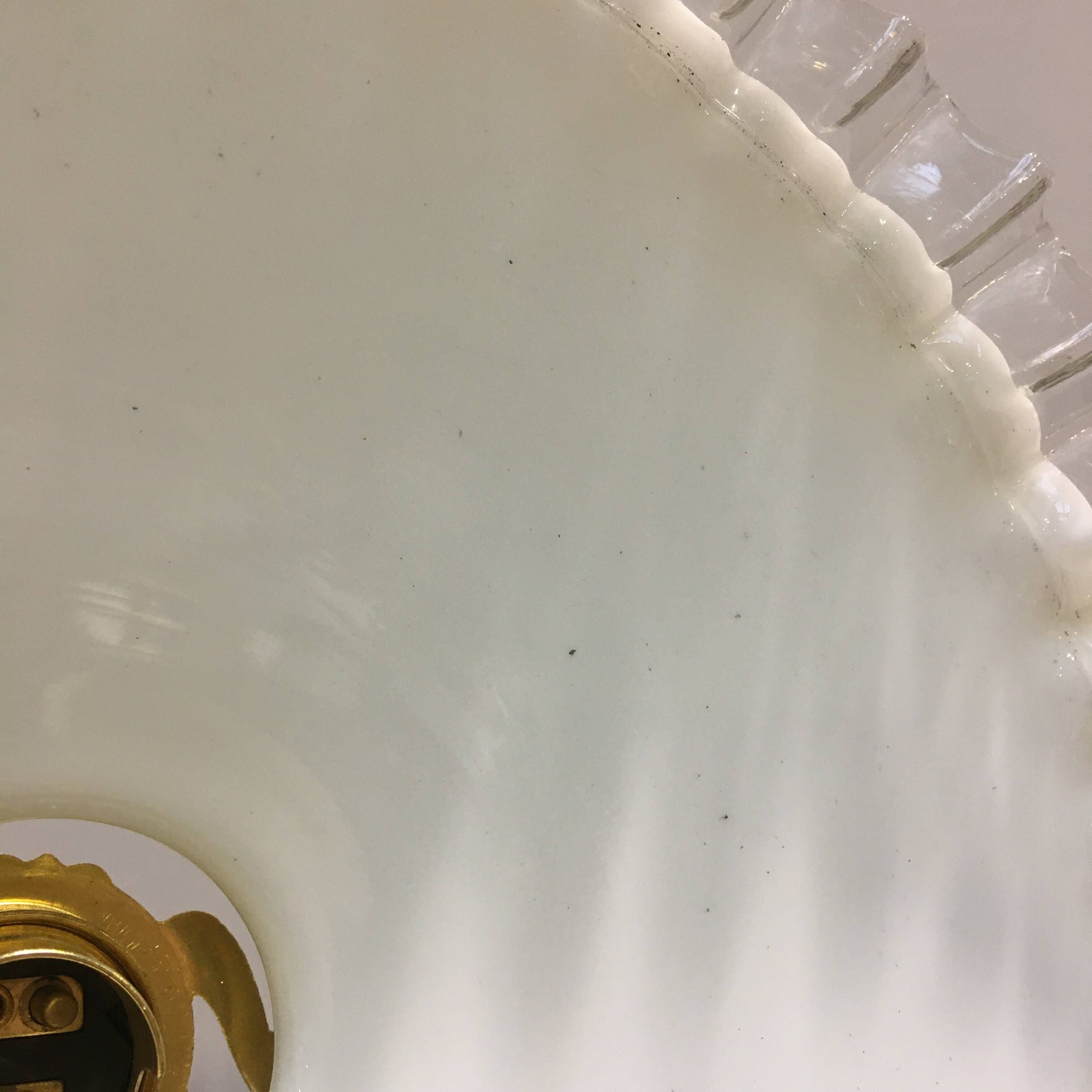 Pair of vintage pendant lights in white opaline and transparent serrated edges
