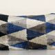 Geometric ikat velvet lumbar pillow