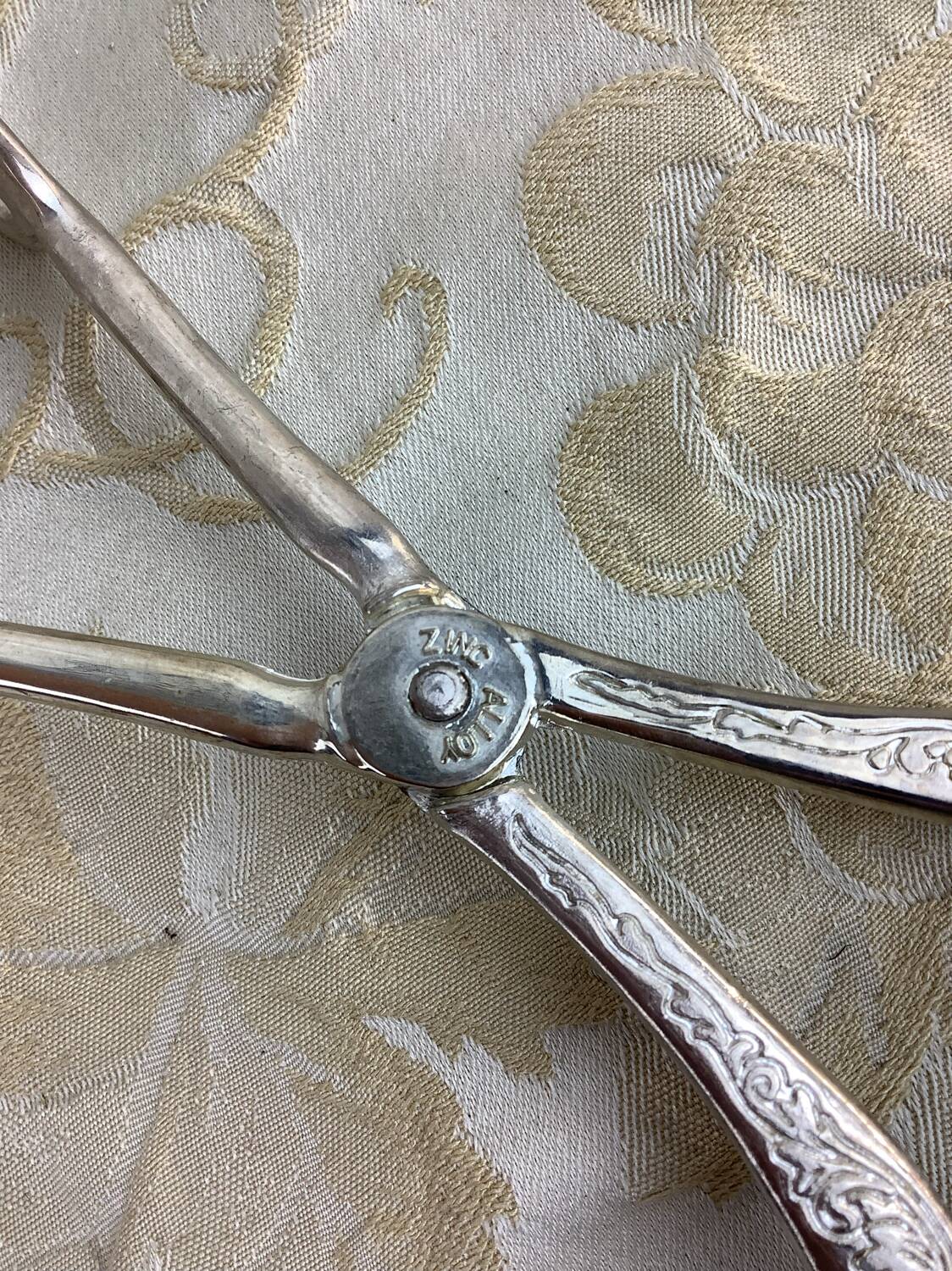 Old cutlery tongs