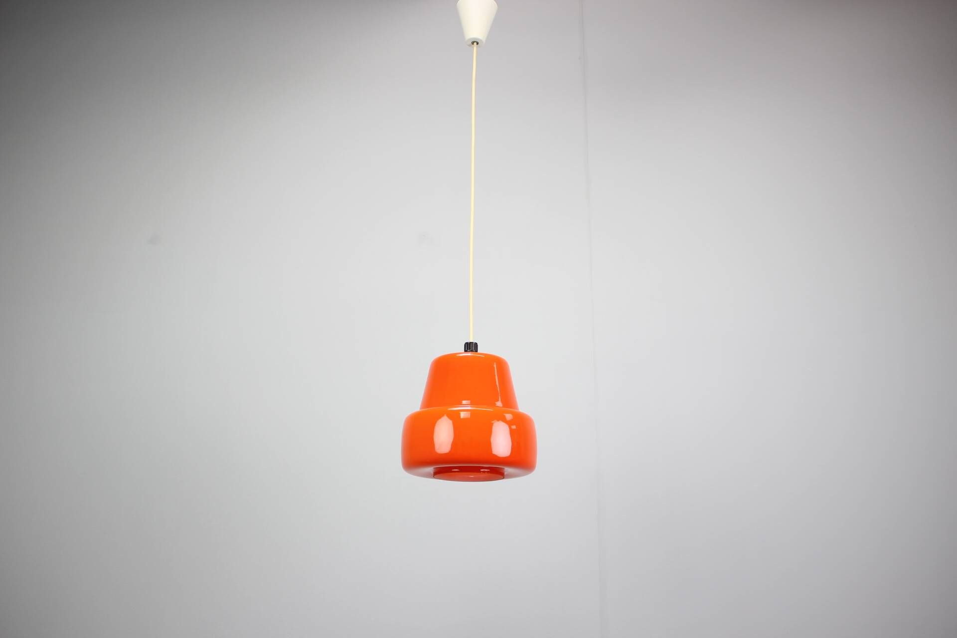 Vintage orange glass pendant lamp, Czechoslovakia, circa 1970.