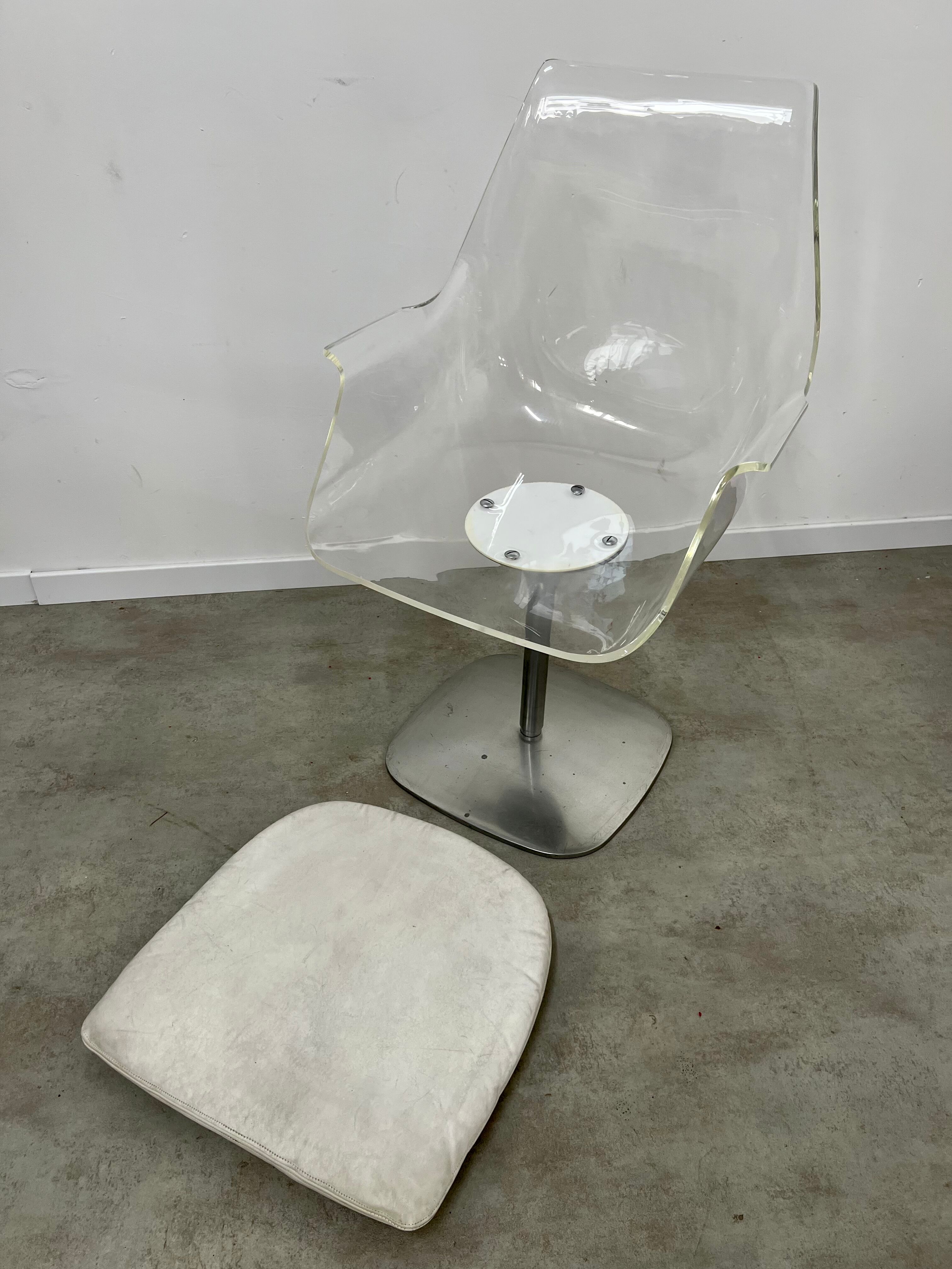 Old swivel desk chair plexiglass and steel design from the 70s