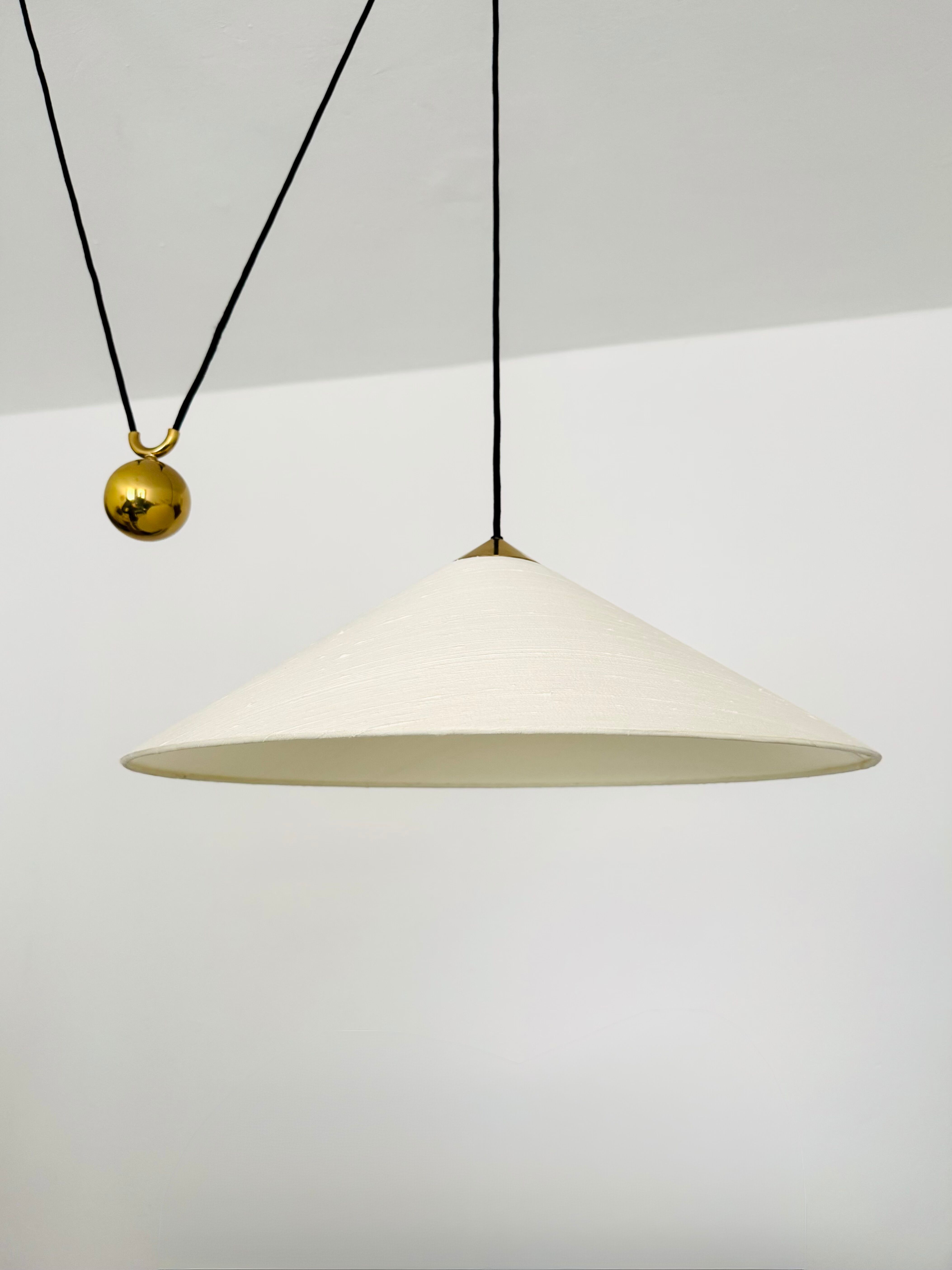 Large Adjustable Brass Pendant Lamp with Counterweight by Florian Schulz