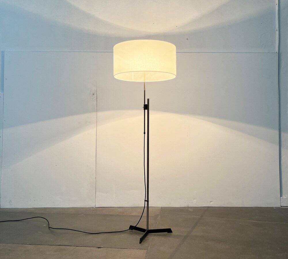 Mid-century German minimalist tripod floor lamp from the 1960s.