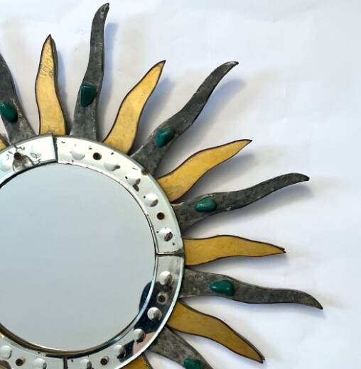 Sun-shaped mirror, wooden frame, circa 1980.