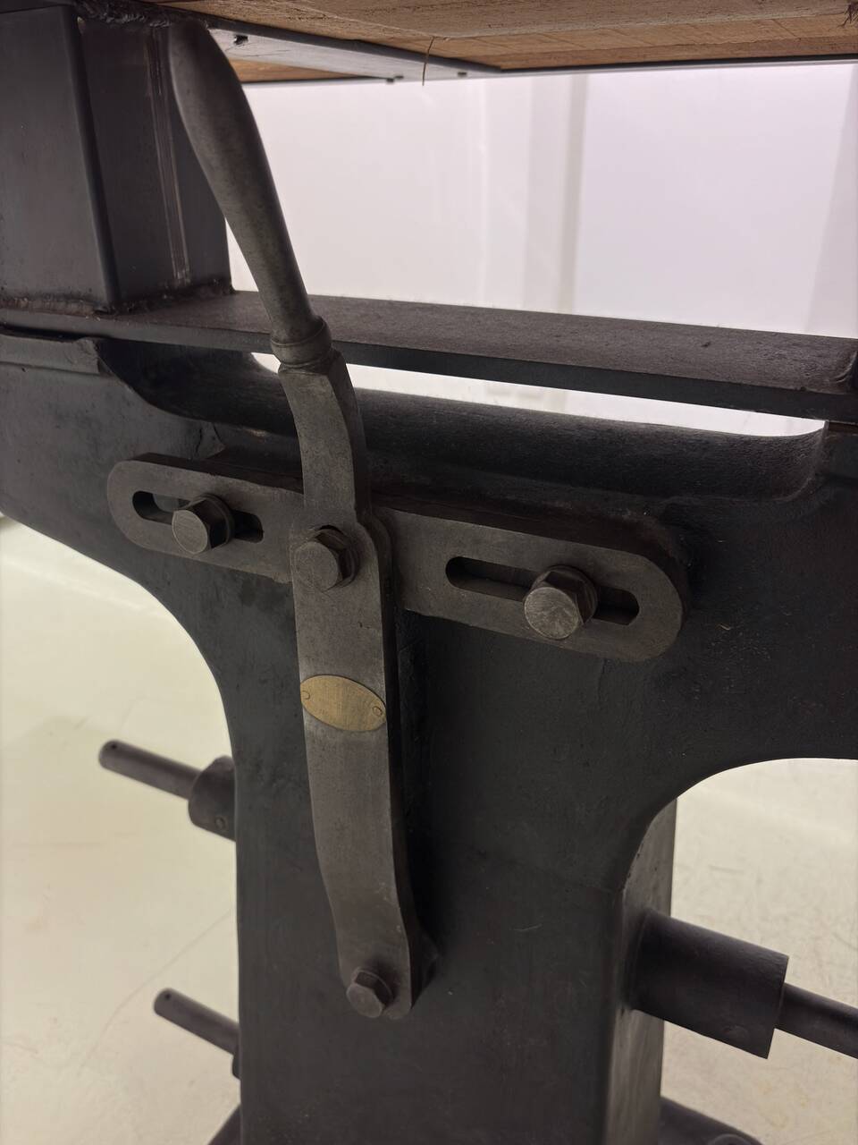 Industrial table with cast iron legs.