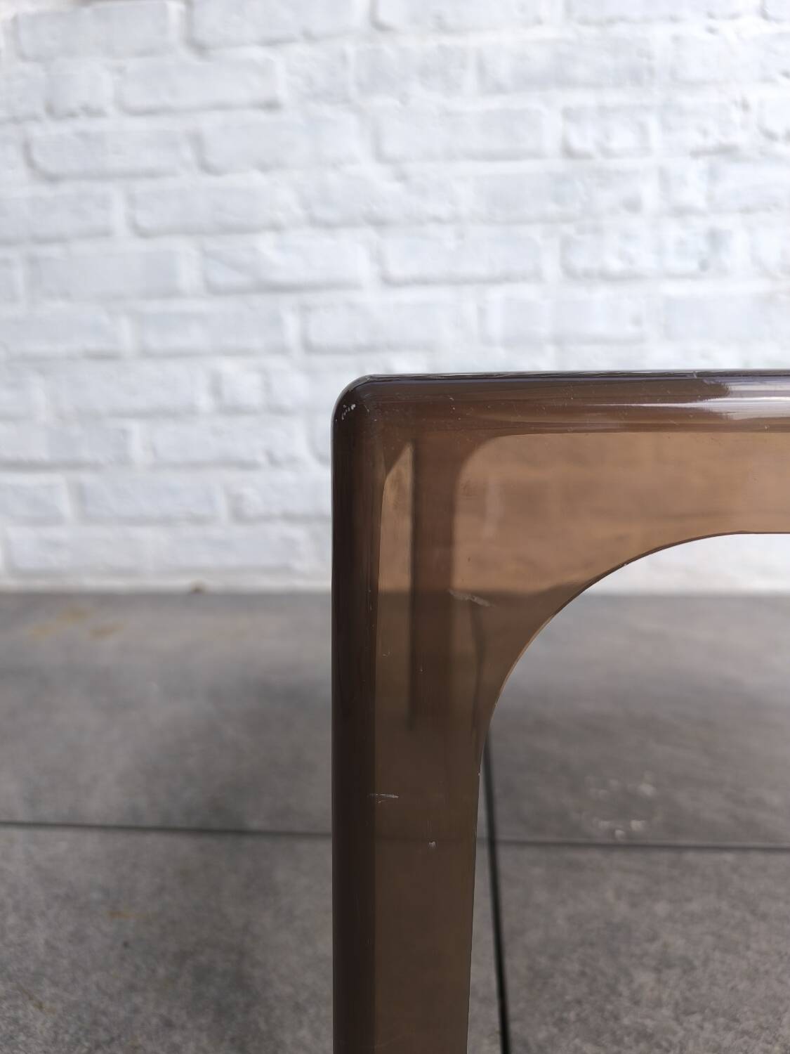 Smoked plexiglass side table