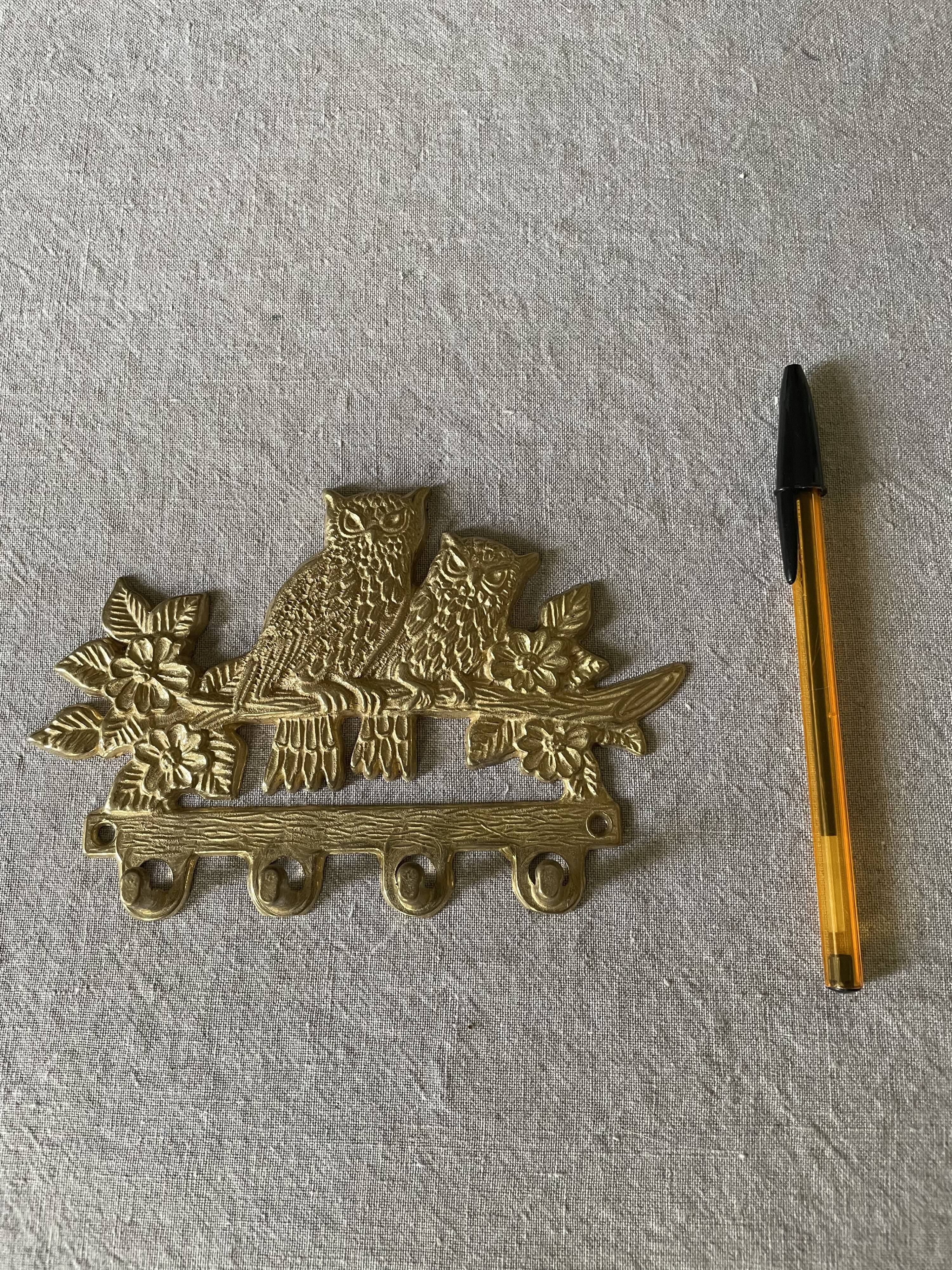 Golden brass owl hook