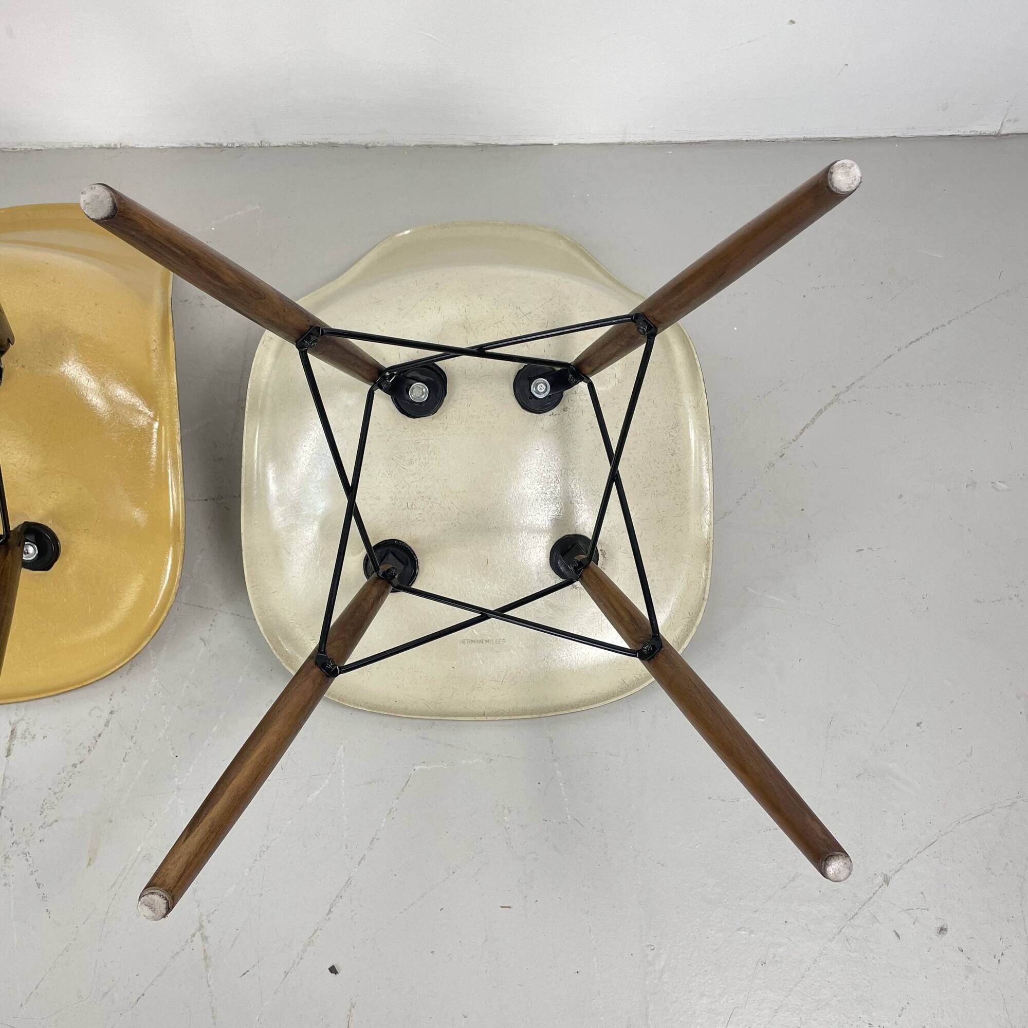 Eames Herman Miller DSW side chairs in greige, seafoam green, light ochre and parchment with slight