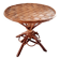 Old bamboo/rattan table with woven palm leaves.