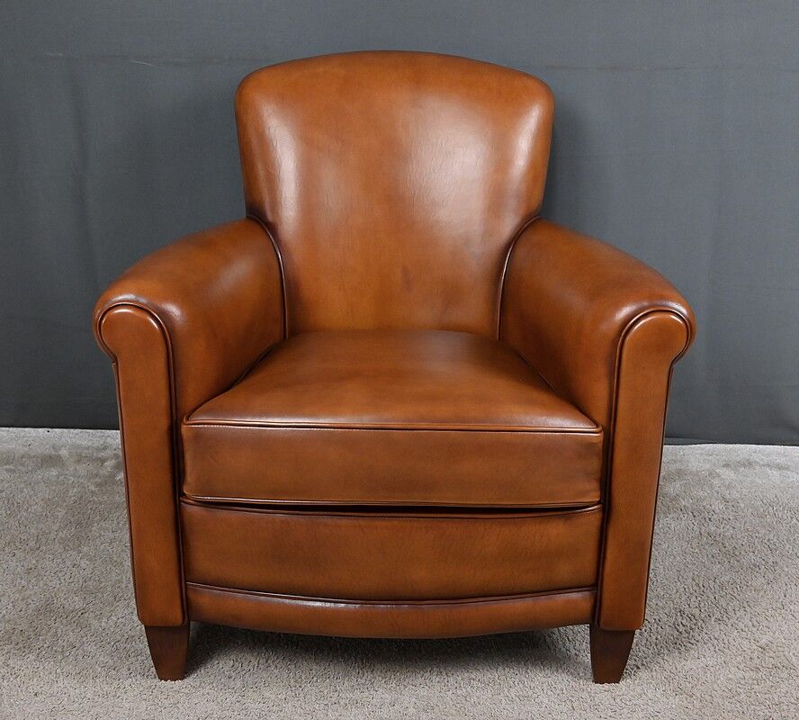 Paire de fauteuils club en cuir