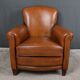 Paire de fauteuils club en cuir