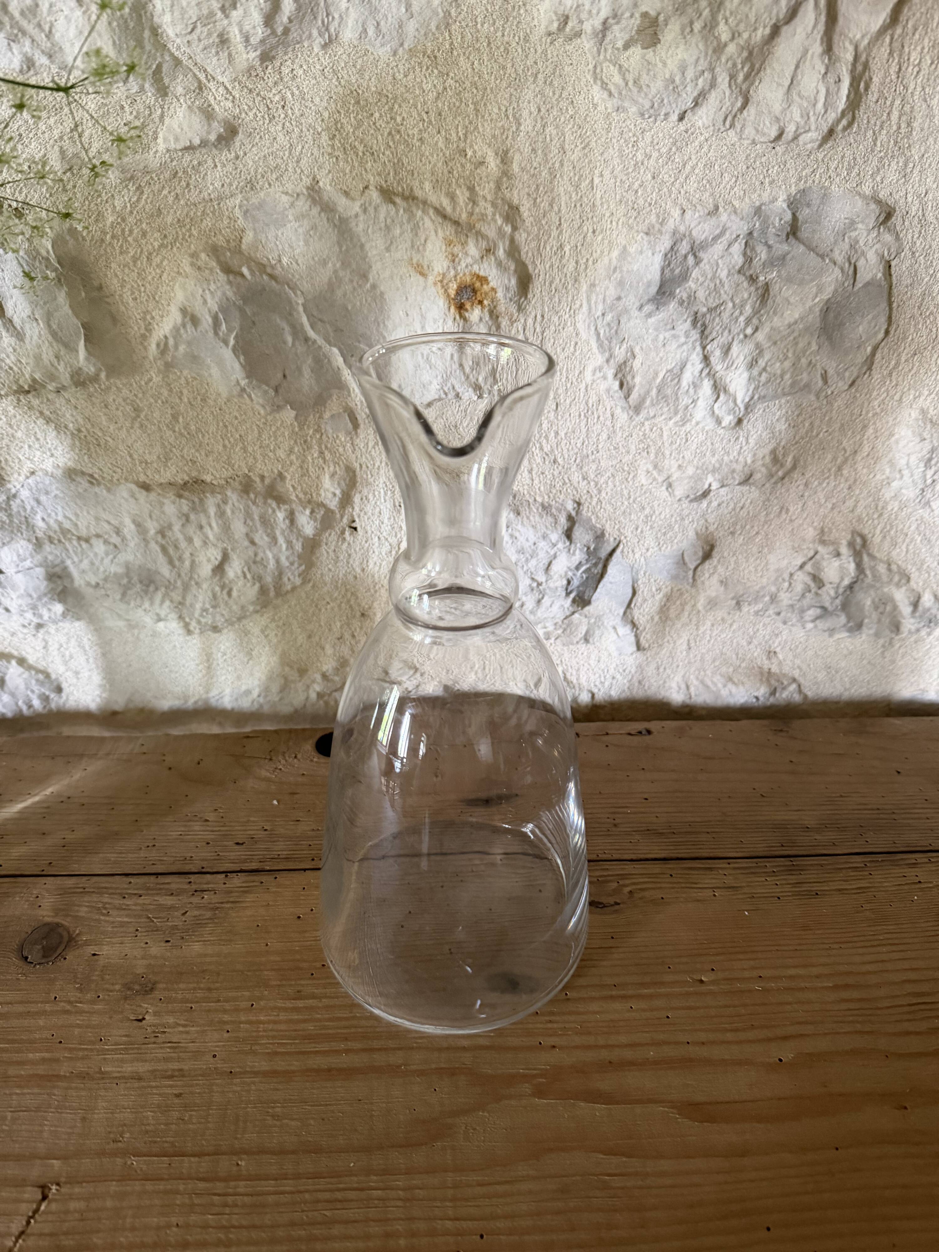 Antique glass pouring jug