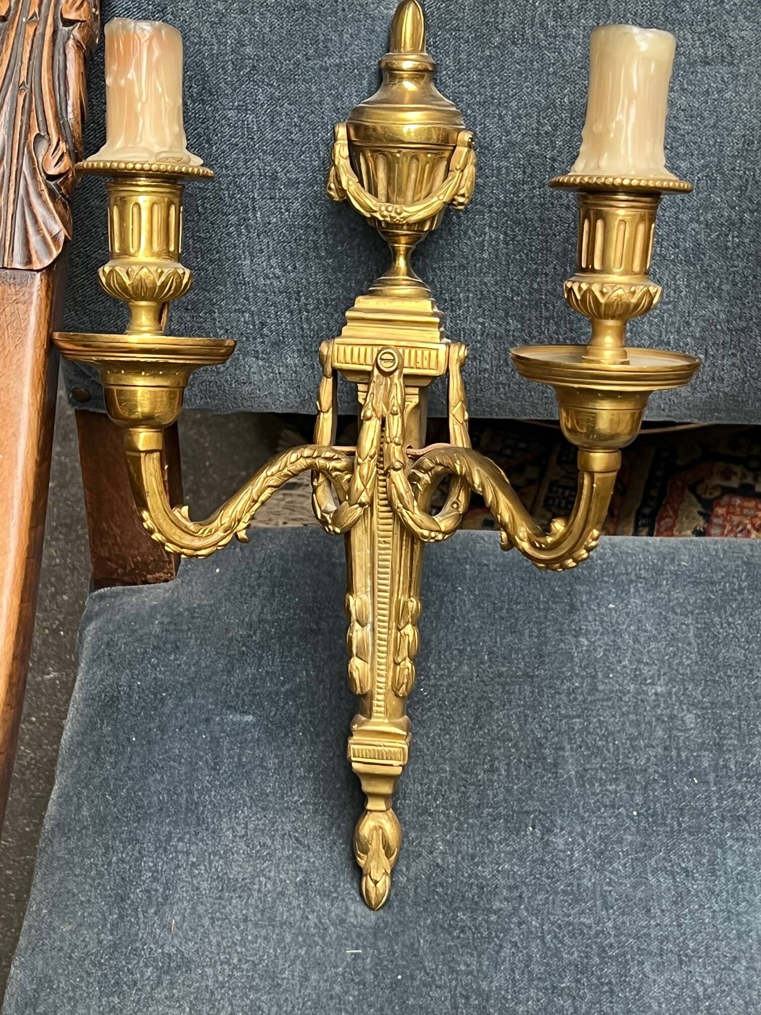 Pair of wall lights. Solid gilded bronze.