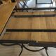 Extendable table in solid oak with wrought iron legs.
