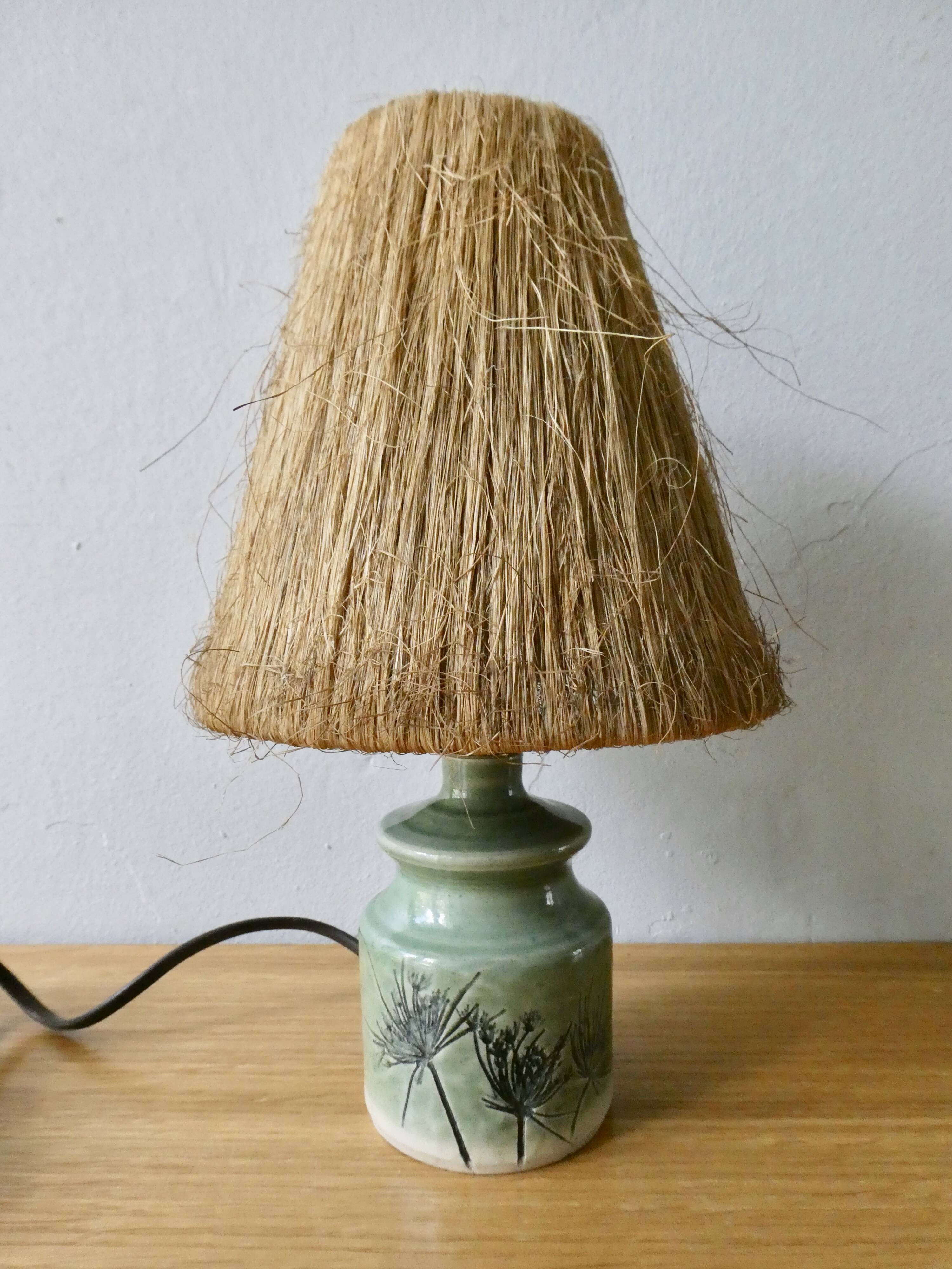 Ceramic lamp, herbarium decoration and fiber blinds
