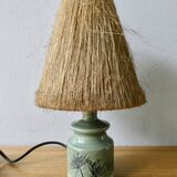 Ceramic lamp, herbarium decoration and fiber blinds