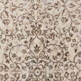 Tapis vintage à motifs floraux beige et marron
