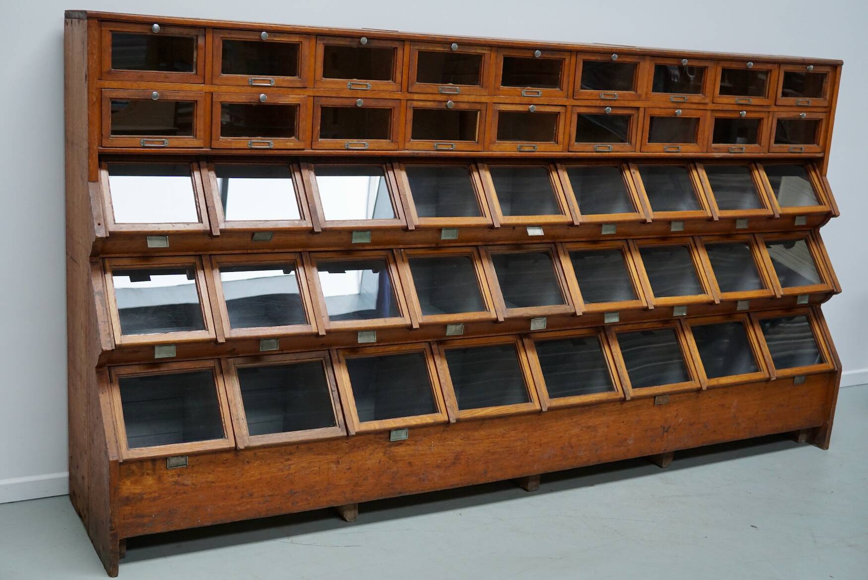 Very large Dutch oak showcase for grocery or haberdashery, 1920s-1930s