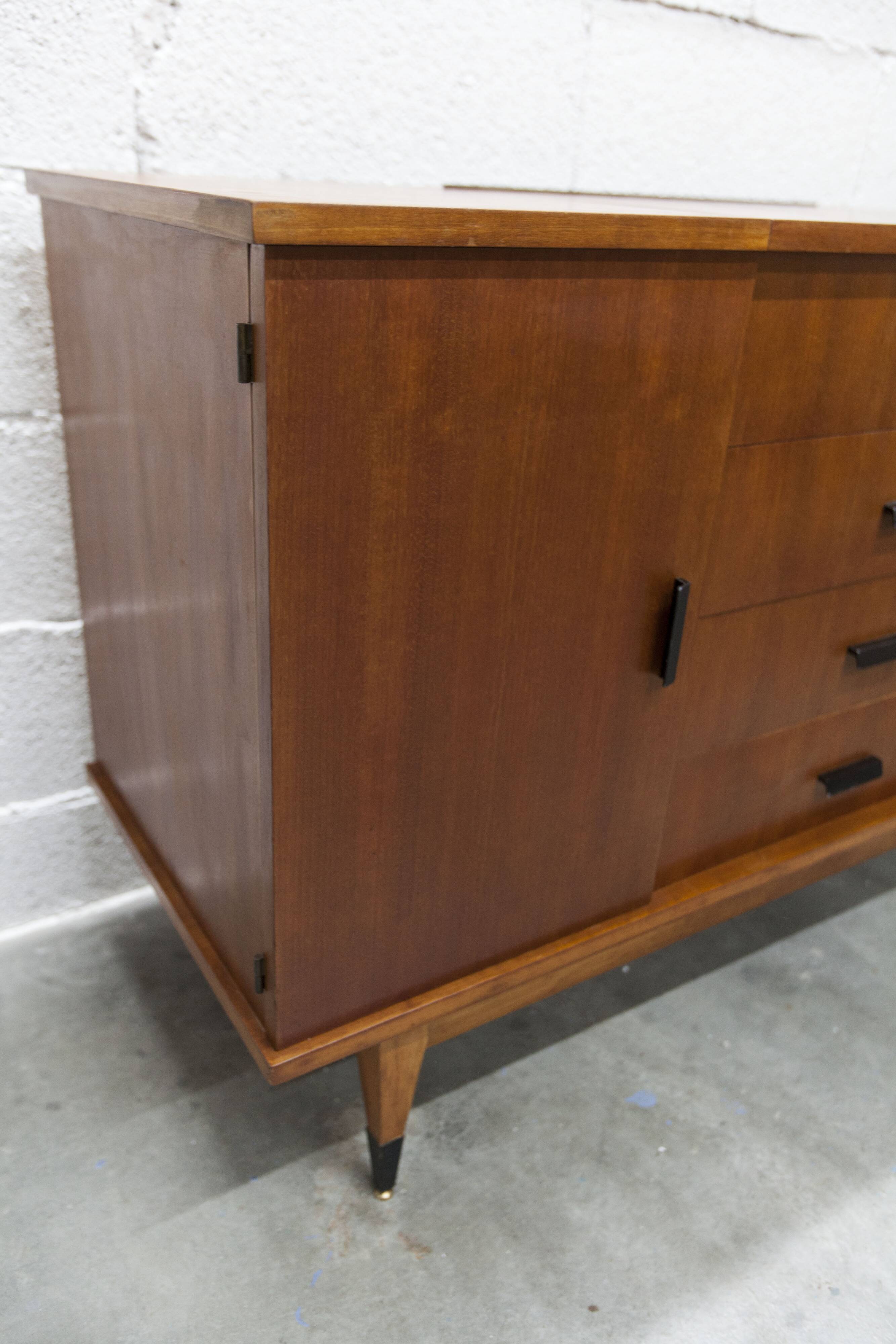 1960s teak sideboard with 4 drawers, 2 doors, and a mirror.