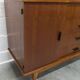 1960s teak sideboard with 4 drawers, 2 doors, and a mirror.