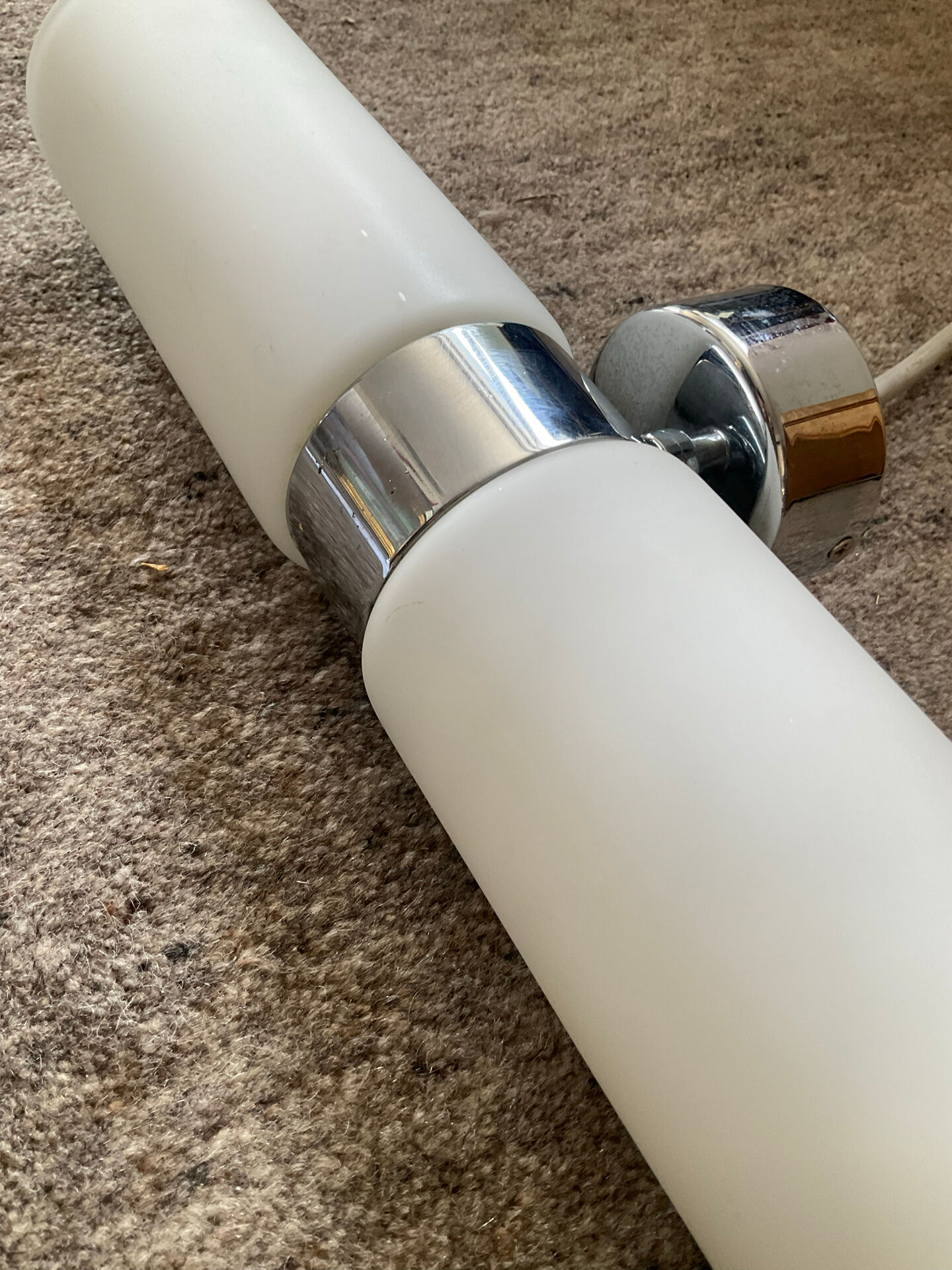 Wall light design in opaline and chrome metal
