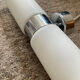 Wall light design in opaline and chrome metal