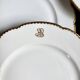 6 scalloped dinner plates in gilded and monogrammed Paris porcelain