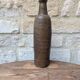 Old handmade terracotta bottle
