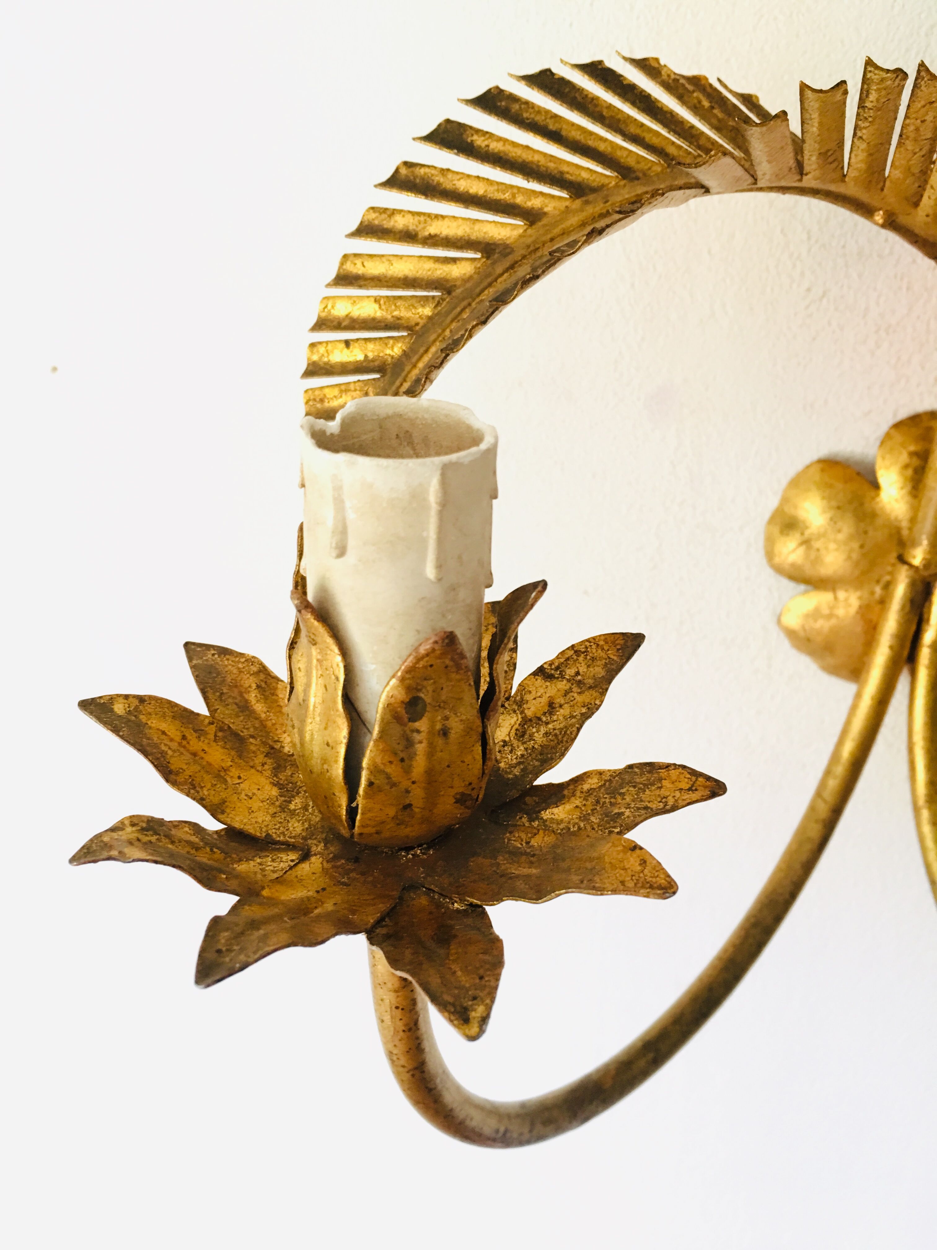 Golden palm leaf sconce