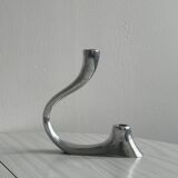 Pair of designer candlesticks in chromed metal