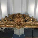 Louis Philippe's era mirror with a gold leaf pediment