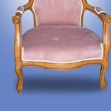 Fauteuil rose en bois