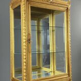 Carved and gilded wooden display cabinet, Louis XVI style, 20th century.