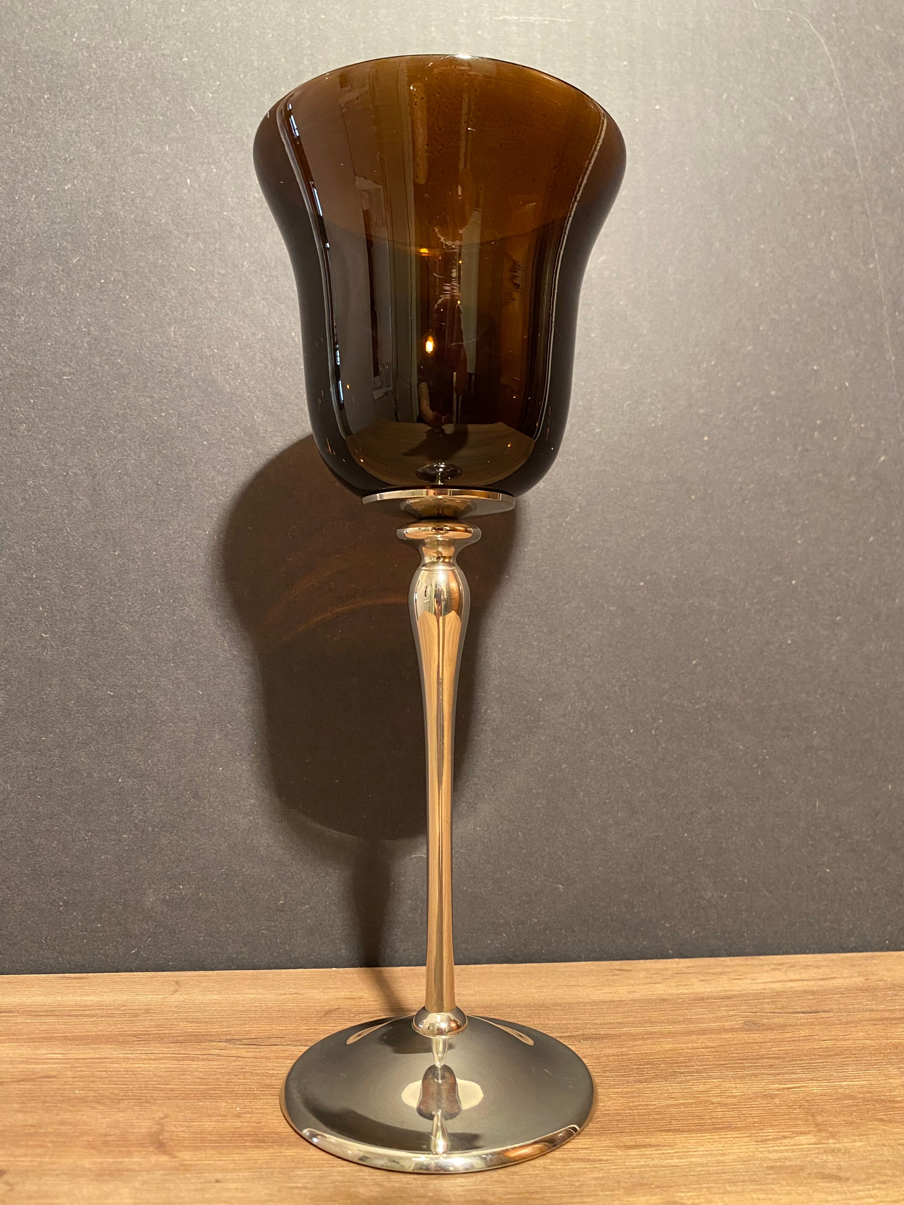 Photophore in tinted glass on high metal foot with silver patina